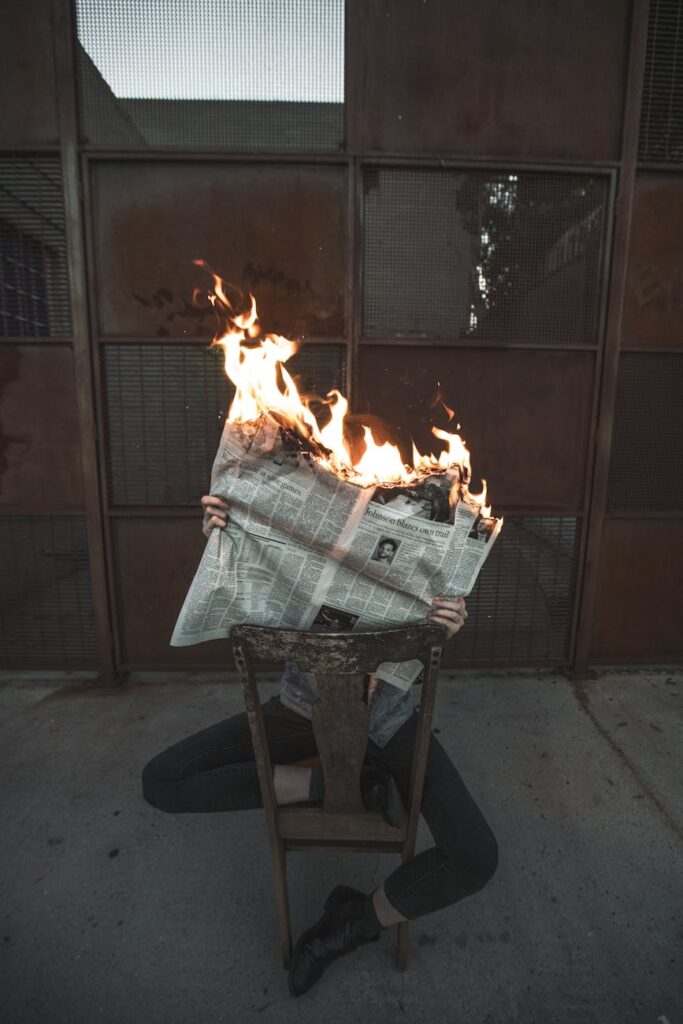 burning newspaper