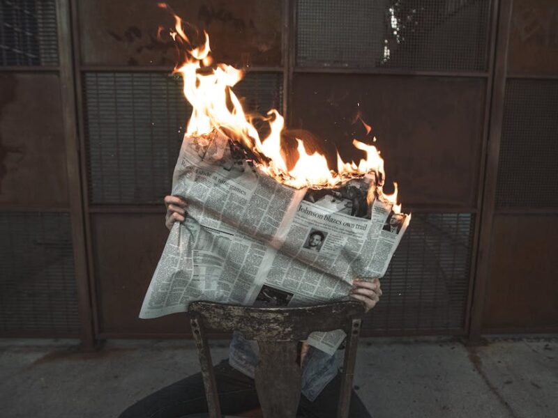 burning newspaper