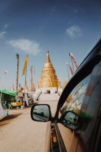 brown hindu temple under blue sky