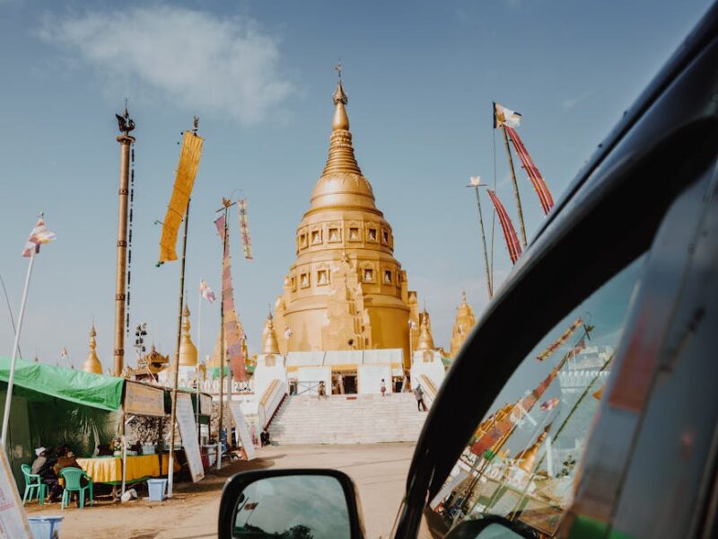 brown hindu temple under blue sky