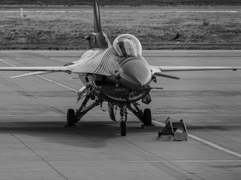 black and white jet fighter on runway in istanbul