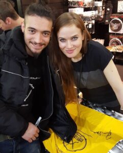 Anika Nilles pictured at signing with fan Alberto Christodoulou