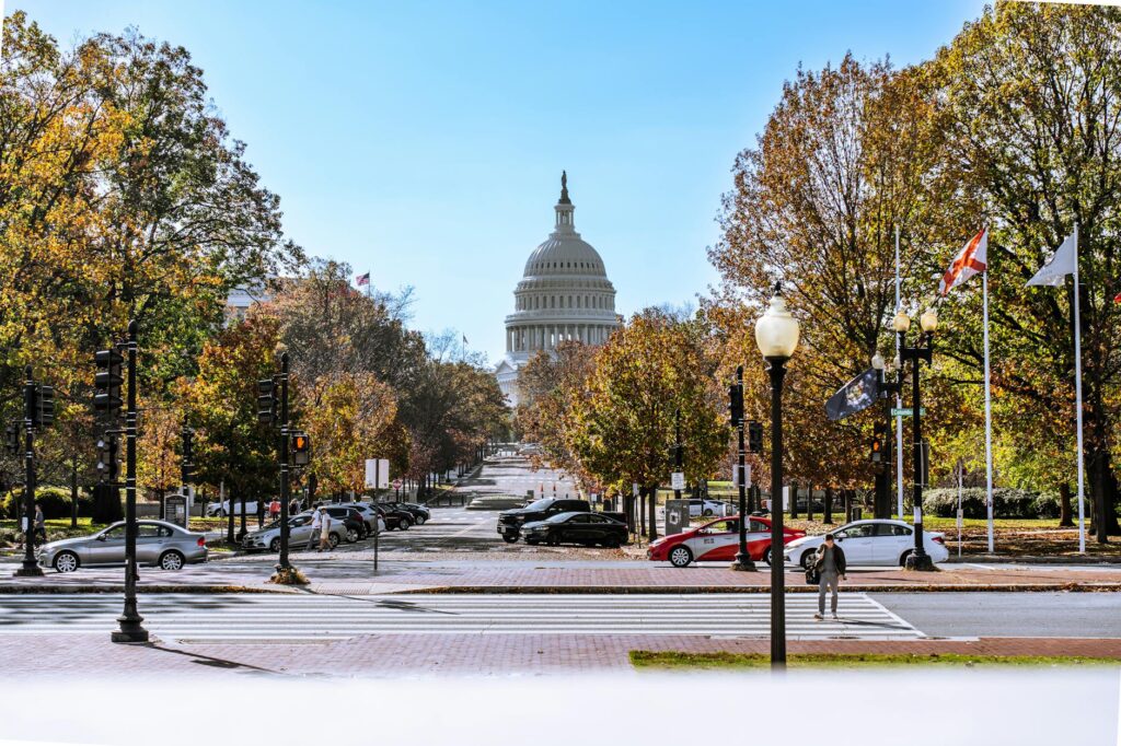 cars parked on the street near the united states capitol