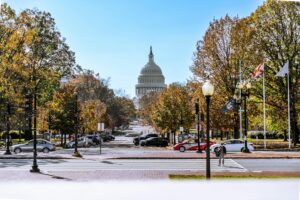 cars parked on the street near the united states capitol