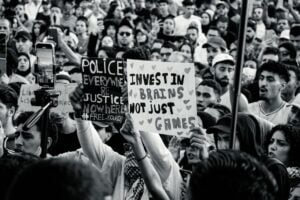 black and white protest with creative signs
