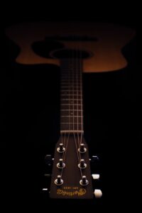 photography of dreadnought acoustic guitar