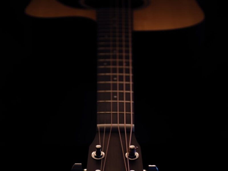 photography of dreadnought acoustic guitar