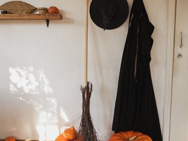 witch costume and pumpkin in a room