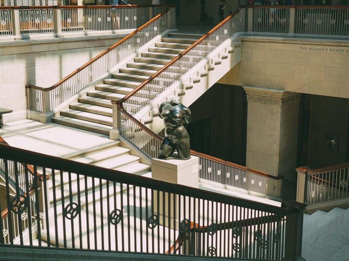 body figure statue on gray column