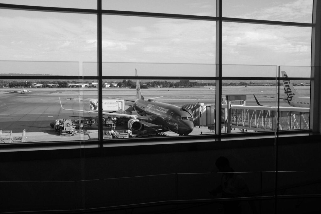 airport black and white hangar plane