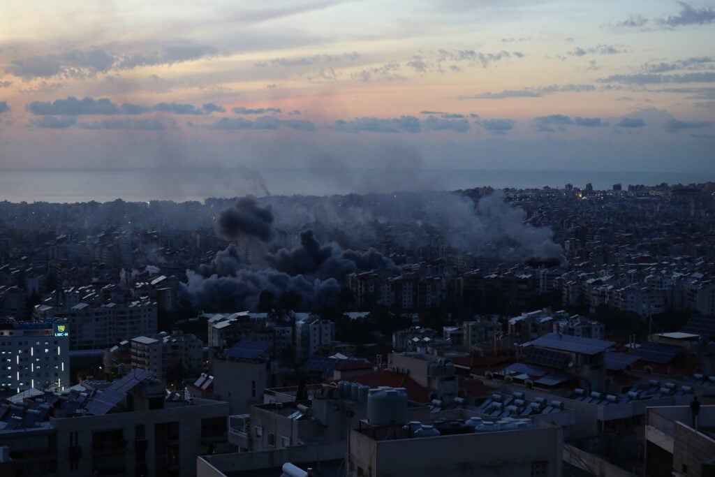 Smoke rises over buildings in Beirut’s Dahyeh suburbs following Israeli airstrikes, March 6, 2026.