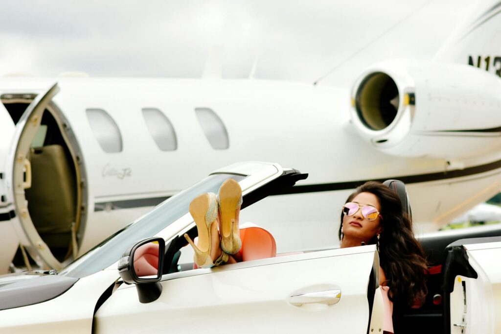 woman in white convertible car