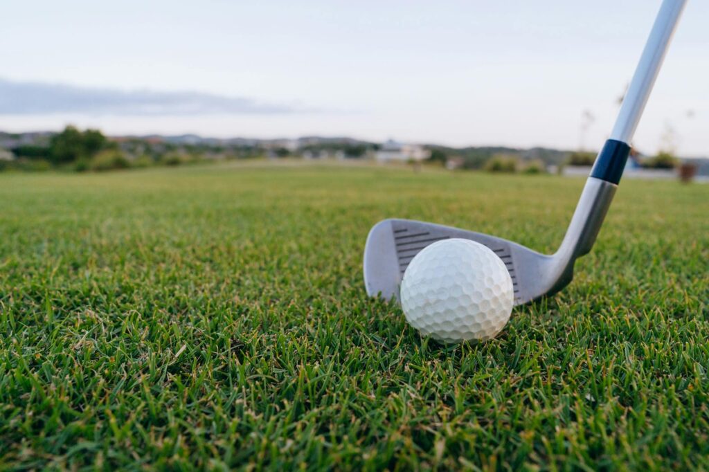 close up shot of a golf ball on the grass
