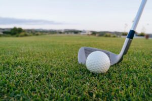 close up shot of a golf ball on the grass