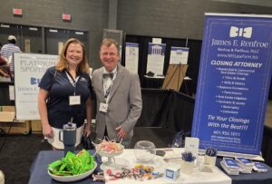 JACKSON, MISSISSIPPI, USA – JUNE 6, 2026: Representatives of Renfroe & Perilloux PLLC pose at their exhibitor booth during the Third Annual Mississippi Housing Expo at the Mississippi Trade Mart in Jackson, Mississippi.