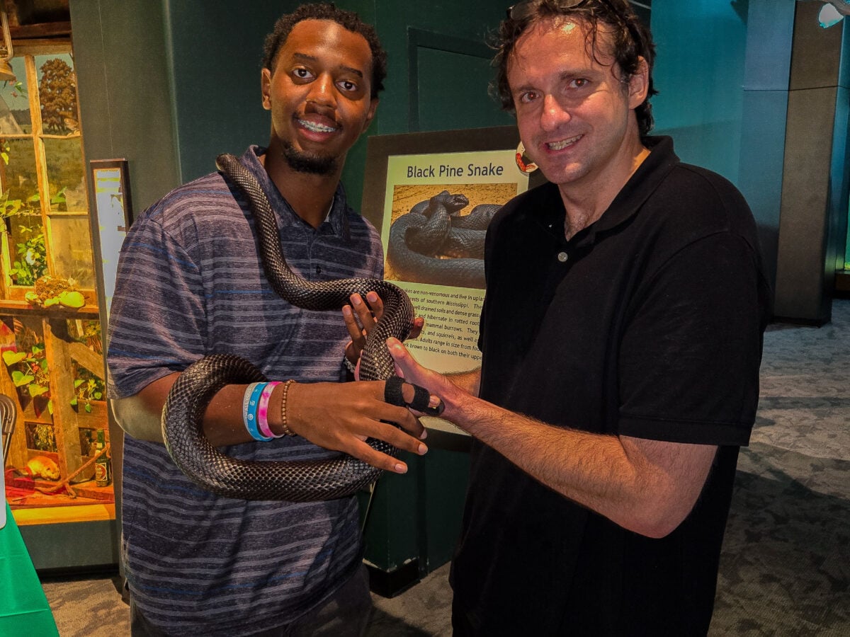 Jackson, Mississippi, USA, June 2026: Dewayne Randall, William Barber at Snake Day Expo at Mississippi Museum of Natural Science Event holding a snake