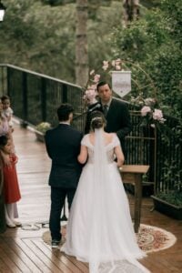 beautiful outdoor wedding ceremony with bride and groom