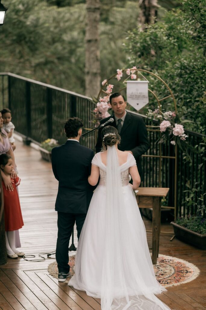 beautiful outdoor wedding ceremony with bride and groom