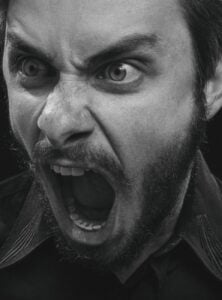 photo of a man screaming