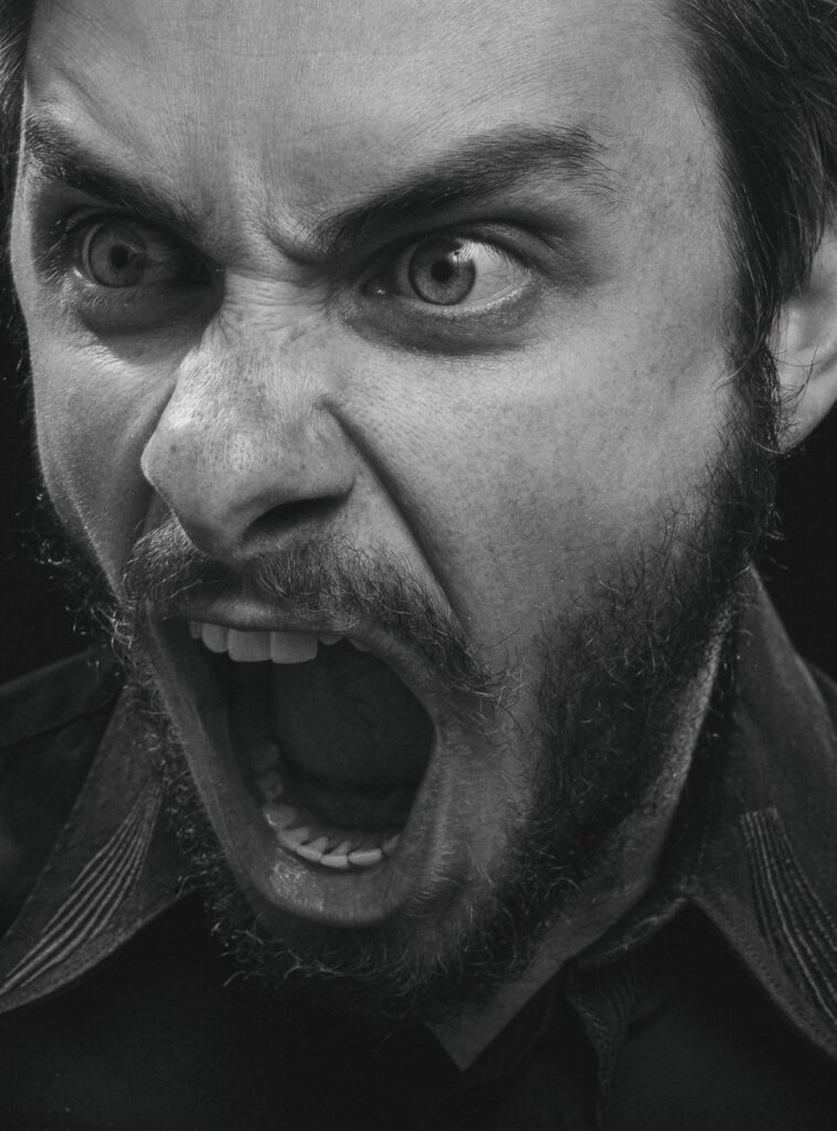 photo of a man screaming