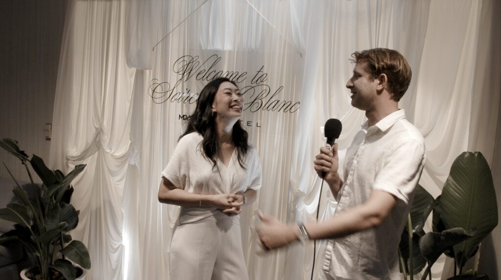 Beverly Hills, CA, USA, July 2026: Jackie Dallas, Kasdyn Click speaking on camera interview at Soiree En Blanc event hosted by Modern Day Wife at Sofitel Hotel Los Angeles.