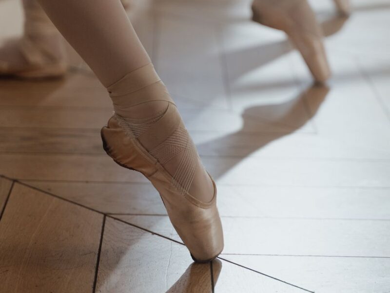 close up shot of pointe shoes of ballet dancers