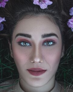 a close up shot of a woman s face