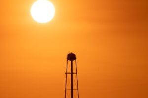 water tower at sunset