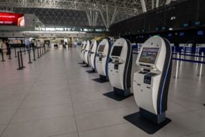 modern airport terminal with self service kiosks